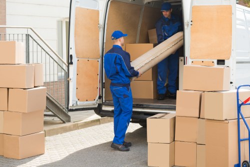 Removal team planning a move in Brixton street