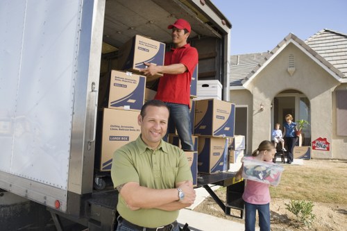Local removal company preparing furniture for moving day