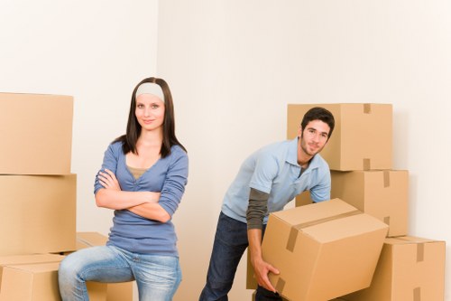 Students loading boxes during a Brixton removal service