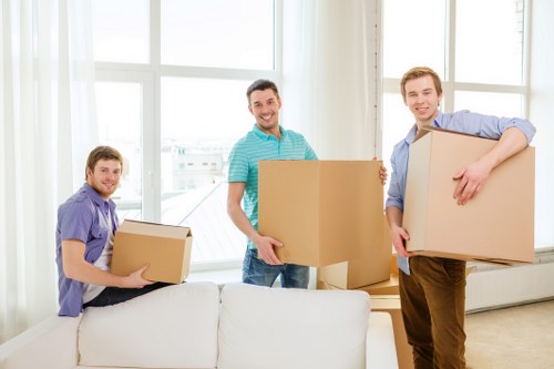 Organised moving truck with furniture and boxes prepared for transport