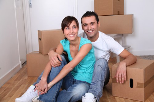 Packed boxes and furniture ready for Brixton house removals