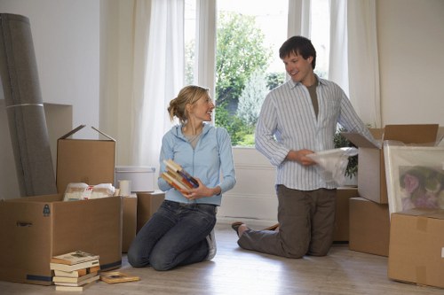 Brixton removal crew working safely with insured and trained movers