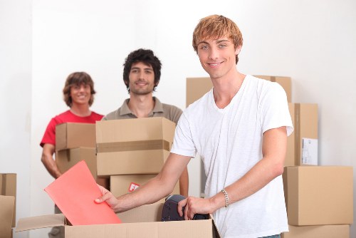 Packed moving boxes ready for removals in Brixton